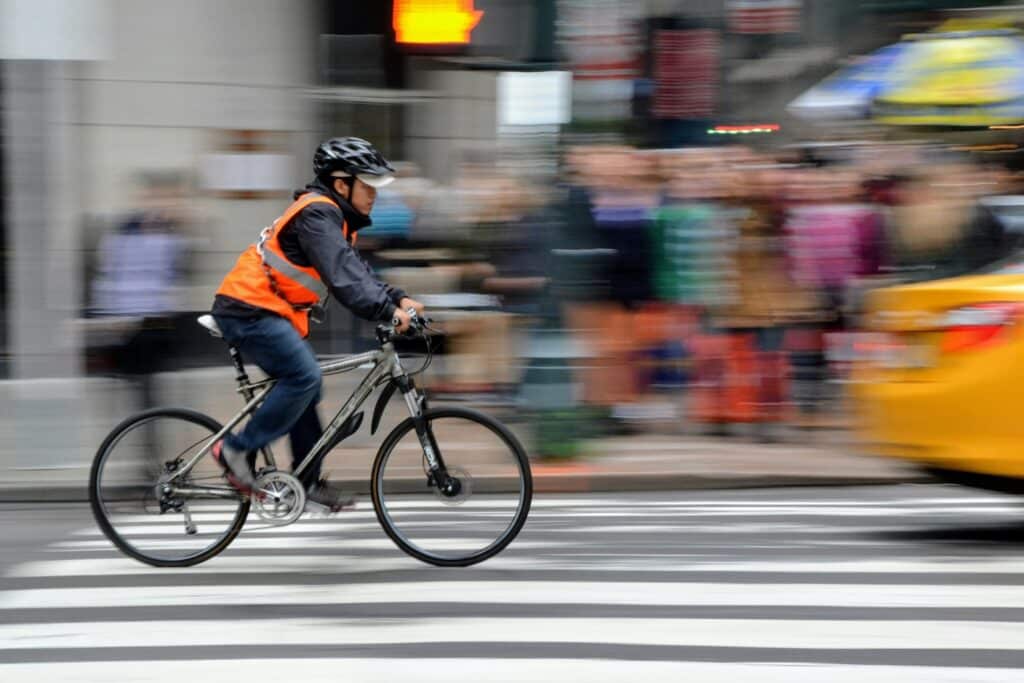 Bicyclist riding through NYC